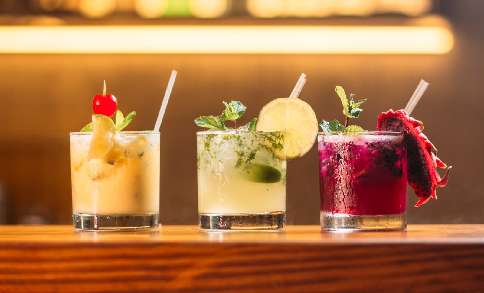 Three cocktails on the bar